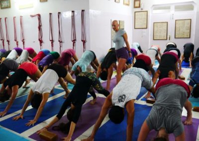 Teaching Yoga Adho Mukha Svanasana in Rishikesh, India